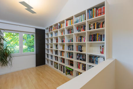 Place a bookshelf on the wall.